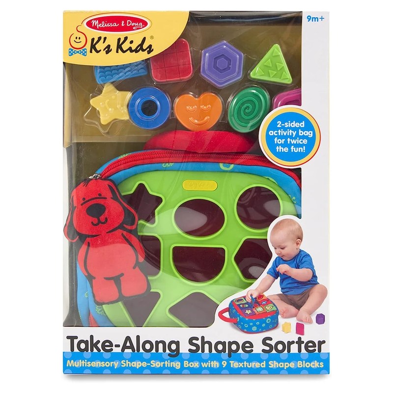 Melissa and Doug K's Kids Take-Along Shape Sorter padded bag with nine textured blocks, shown in retail packaging