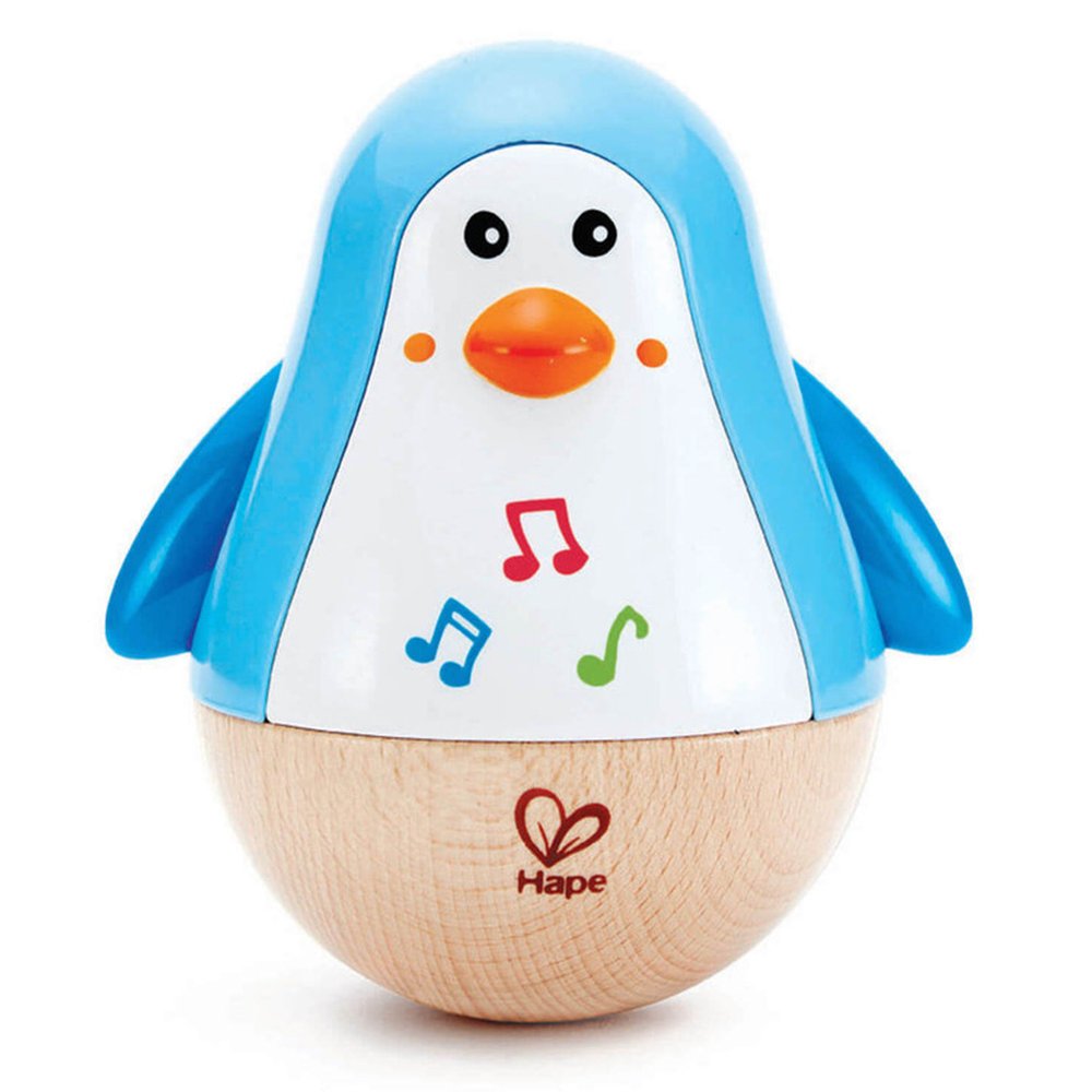 Hape Penguin Musical Wobbler wooden penguin toy with a rounded wobble base